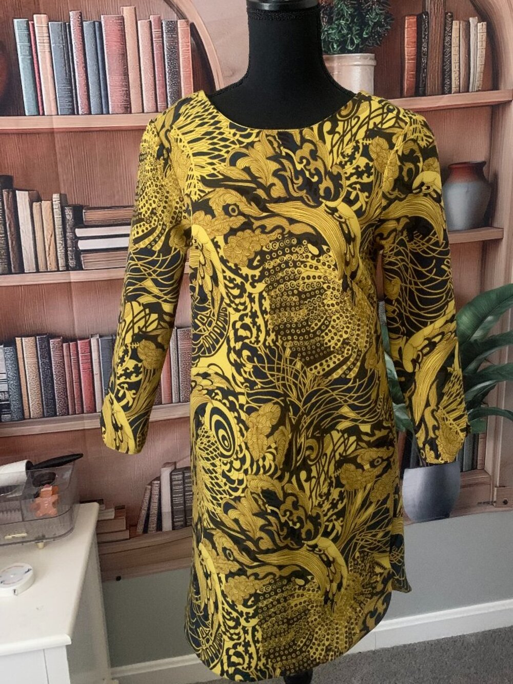 Goldish Yellow dress with Blue abstract design.